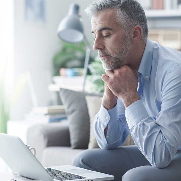 businessman-working-at-home-2023-11-27-05-32-36-utc